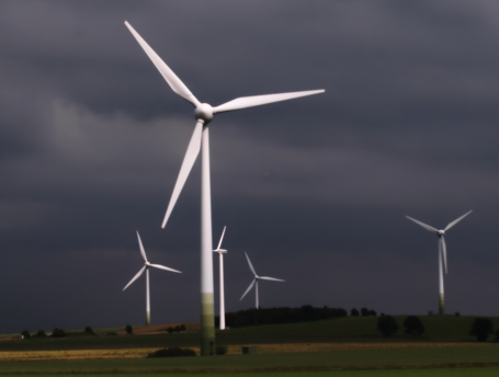 Wind turbines in Saxony, Germany.   Wind turbines don't interfere with other land uses such as farming.